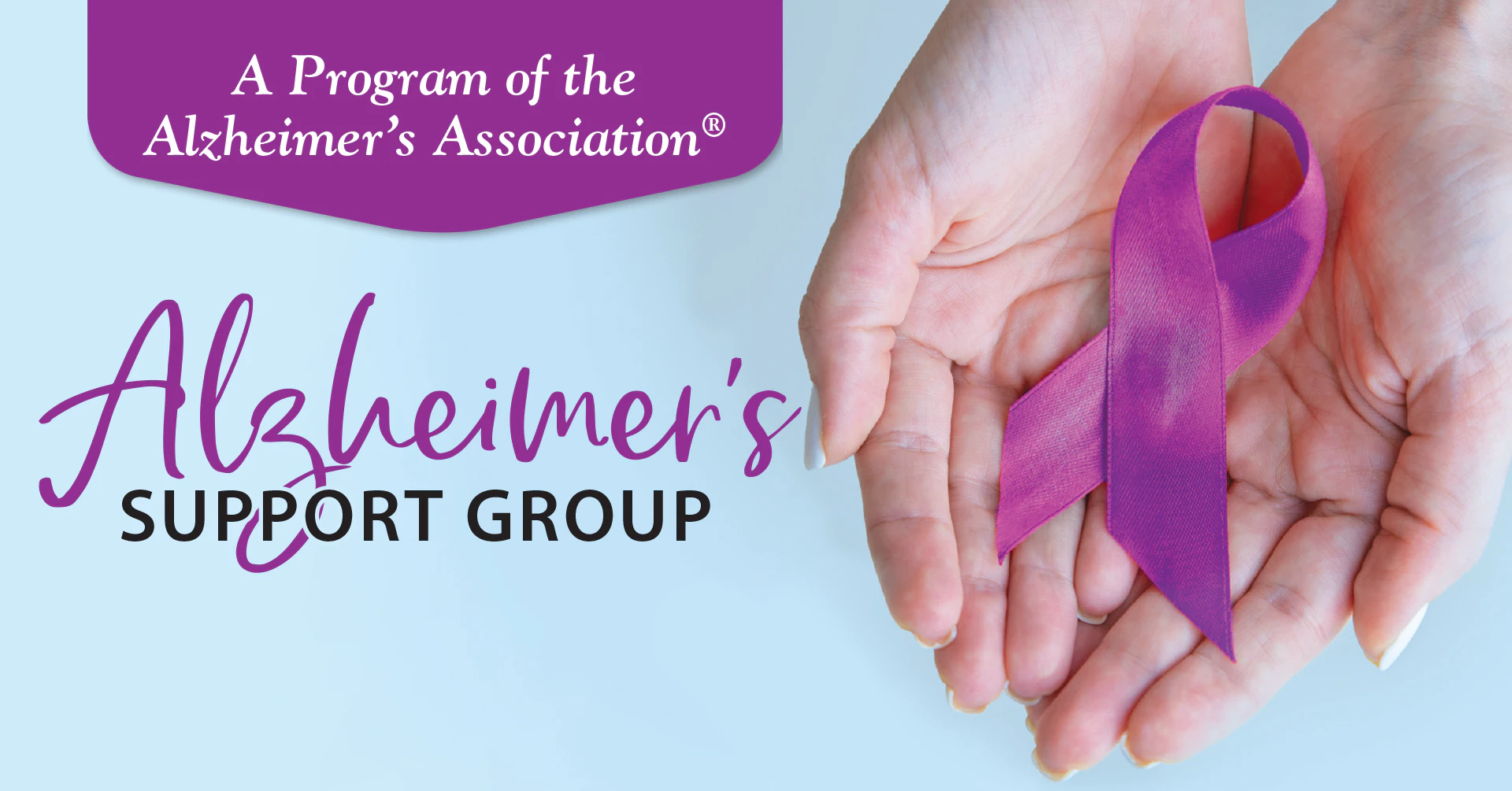 Hands holding purple Alzheimer’s awareness ribbon
