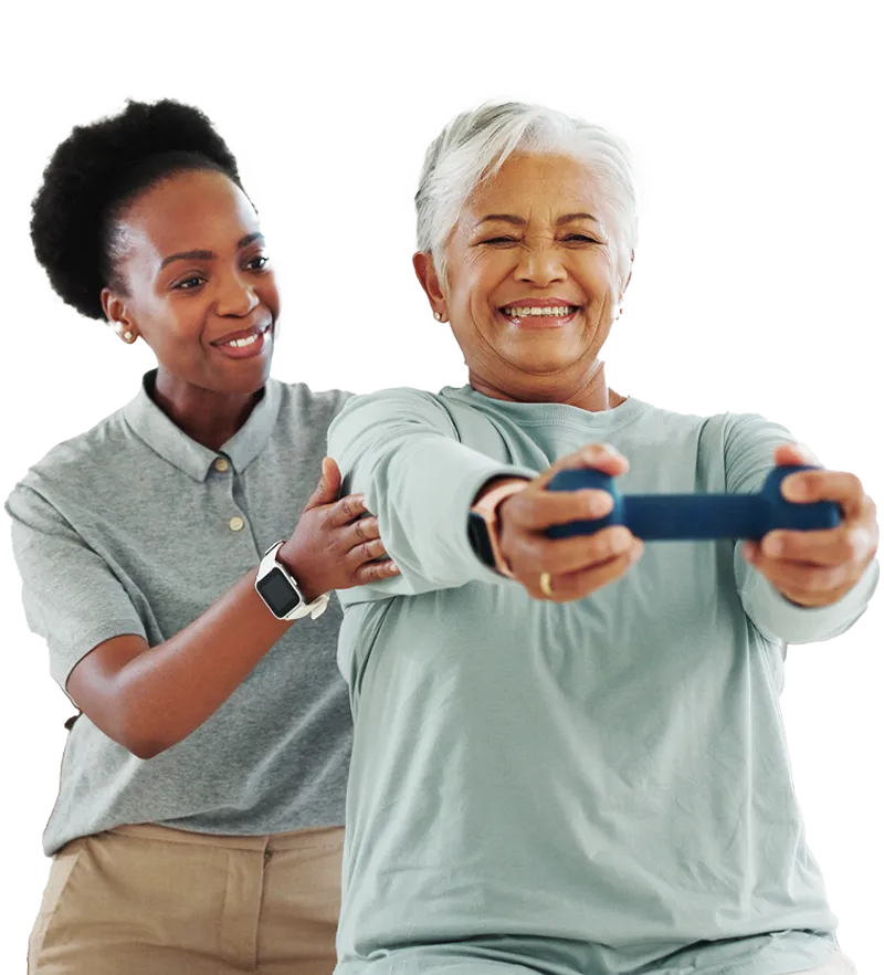 Senior woman exercising with resistance band and trainer
